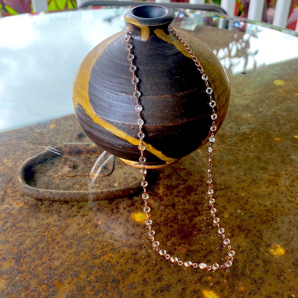 Touchstone Crystal rose gold mini chanelle necklace.